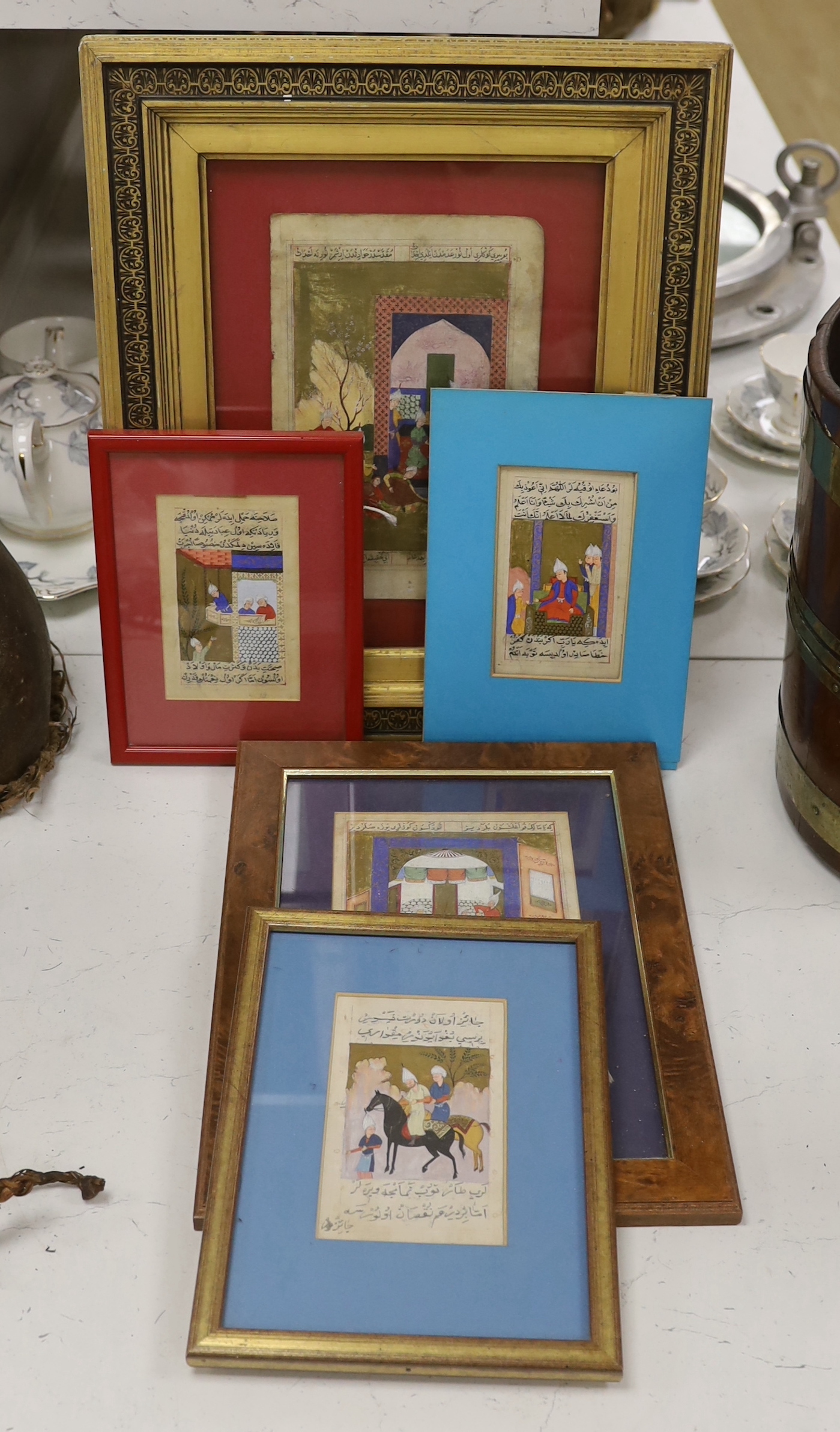 Five Indian Mughal style gouache paintings of court scenes and figures on horseback, largest 22 x 14.5cm